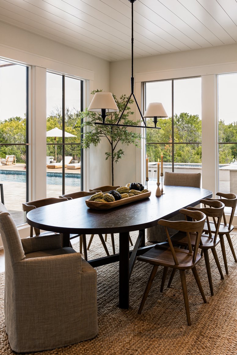 Dining Room table with windows in Flint Hills by Pure Salt