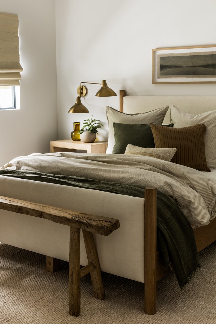 Guest bedroom with bench in Malibu