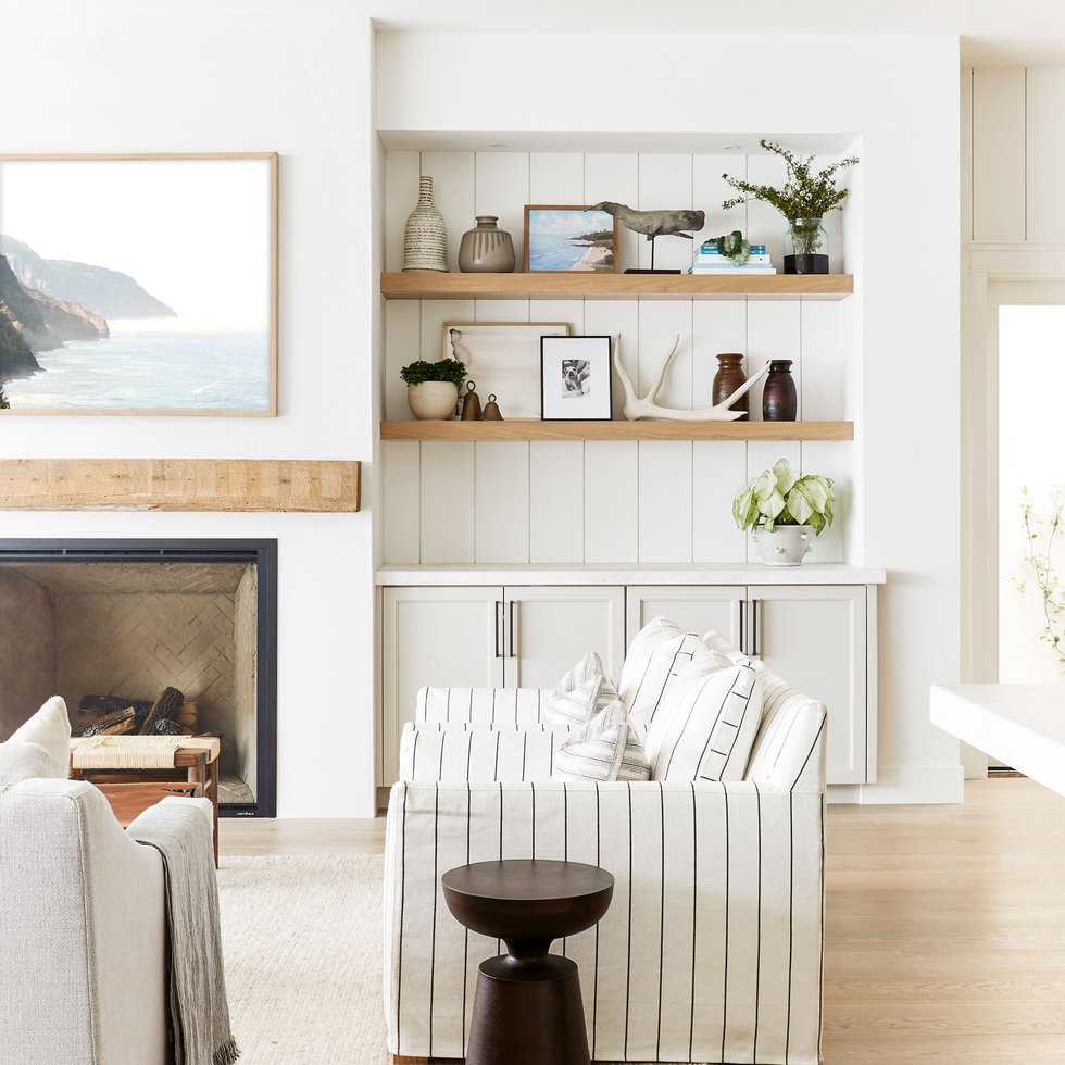 Living room fireplace in Three Arch Bay