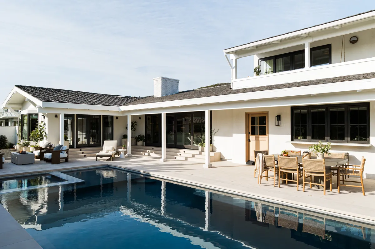 Outdoor living by pool in Emerald Bay by Pure Salt