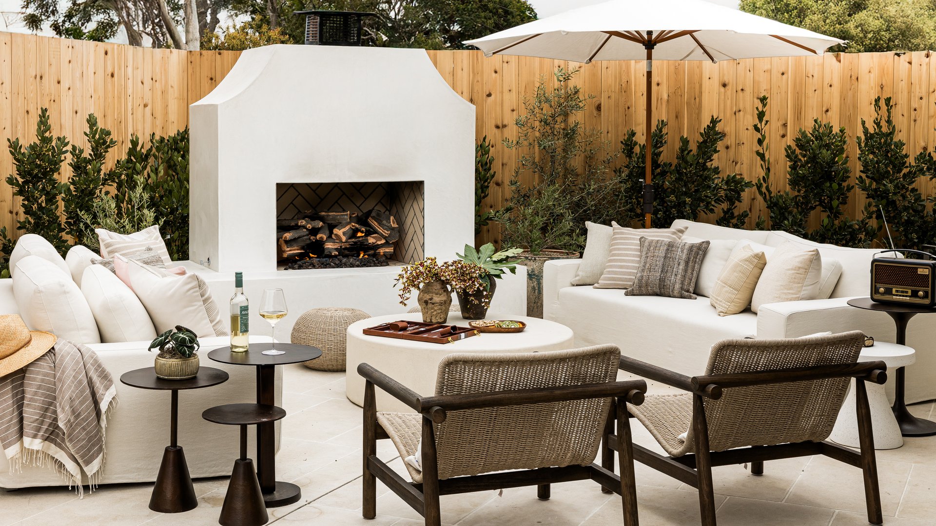 Outdoor fireplace in Rochell Retreat by Pure Salt