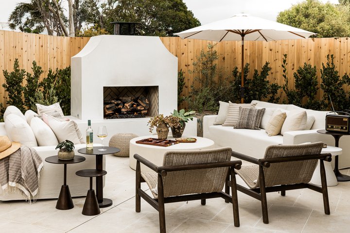 Outdoor fireplace in Rochell Retreat by Pure Salt