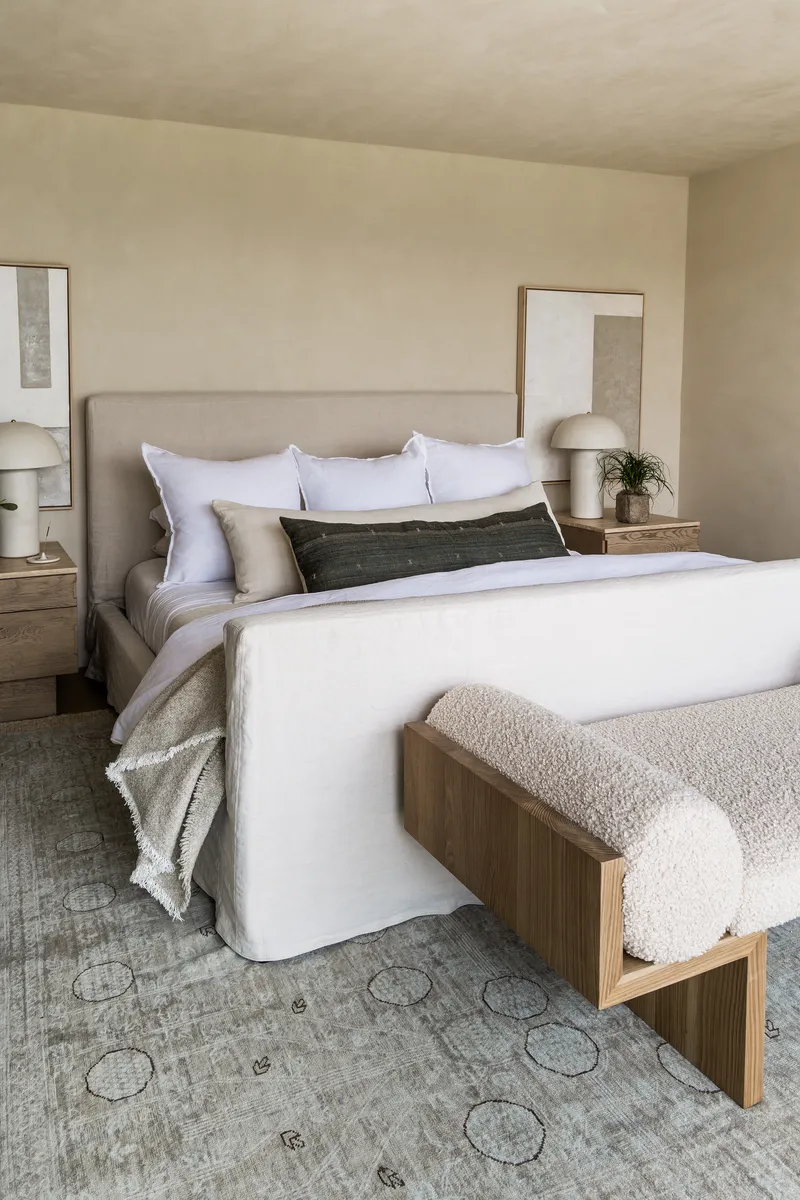 Primary Suite bed and bench in Malibu