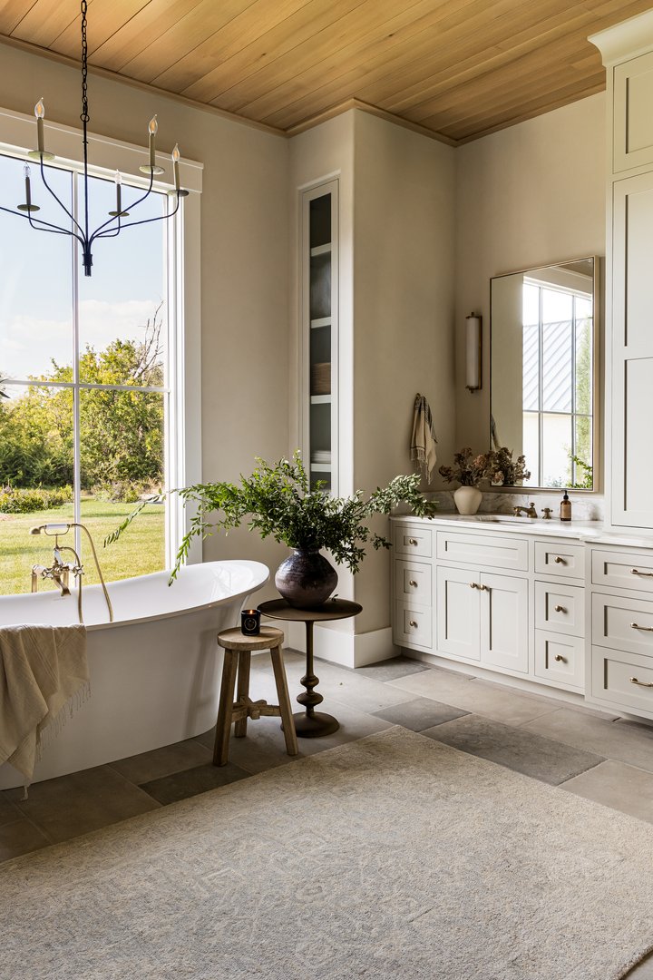 Primary Suite bathroom with tub in Flint Hills by Pure Salt