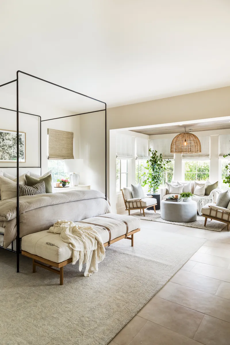 Primary Suite bedroom and sitting area in Coastal Canyon